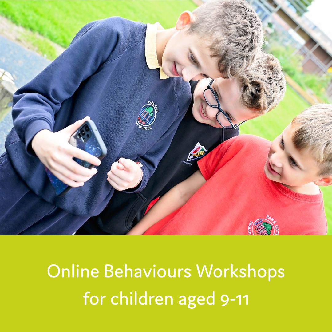 Group of school boys huddled around one phone with text says 'Online Behaviour Workshops for children aged 9-11'